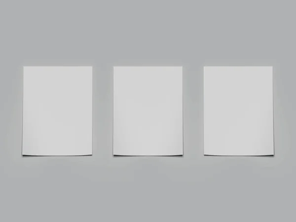 Drei weiße Papierblätter mit Schatten. 3D-Darstellung — Stockfoto