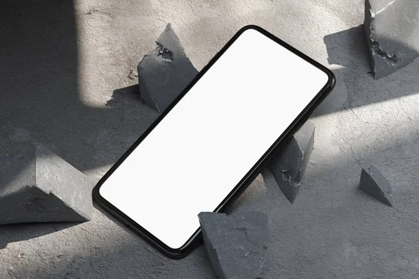 Mobile phone with blank screen near concrete broken forms on concrete floor. 3d rendering. — Stock Photo, Image