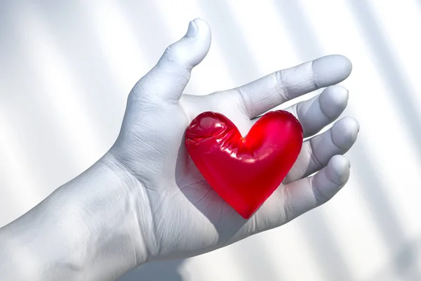 White Human Hand Holding Red Heart op witte achtergrond. Voorstel. Wat een verrassing. 3d destructie. — Stockfoto