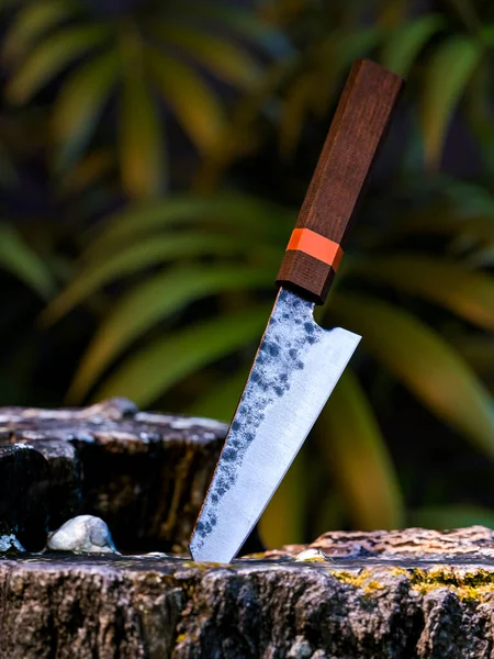 Luxury Japanese Kitchen Knife Forced Into Tree on Exotic Tree Background. Damascus Steel Chef Knife. 3d rendering — Stock Photo, Image
