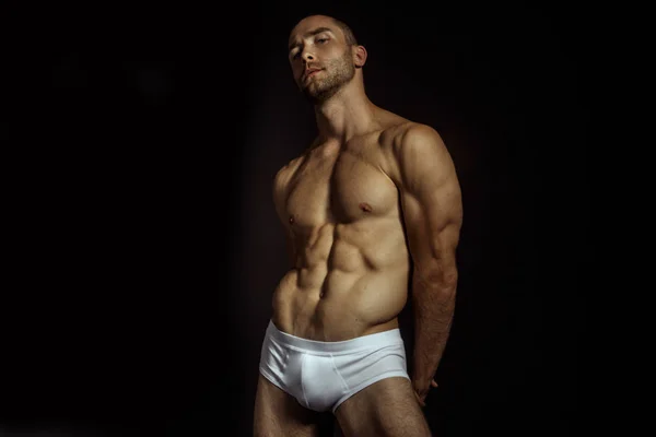 Starkes Muskulöses Männliches Modell Weißer Unterwäsche Auf Schwarzem Isoliertem Schrifthintergrund — Stockfoto