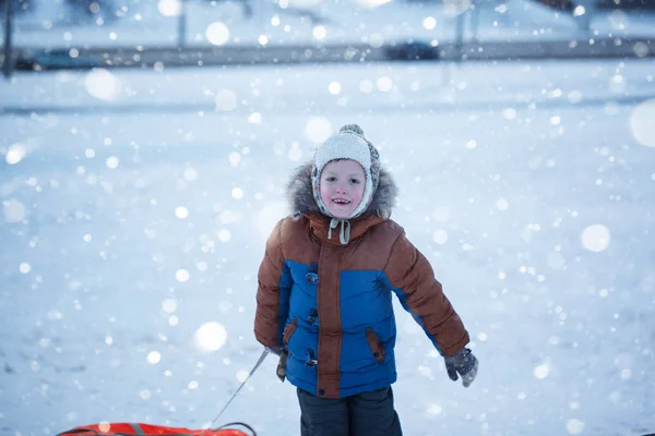 Portrait boy with tubing in the snow, wintertime, happiness concept. — Stock Photo, Image