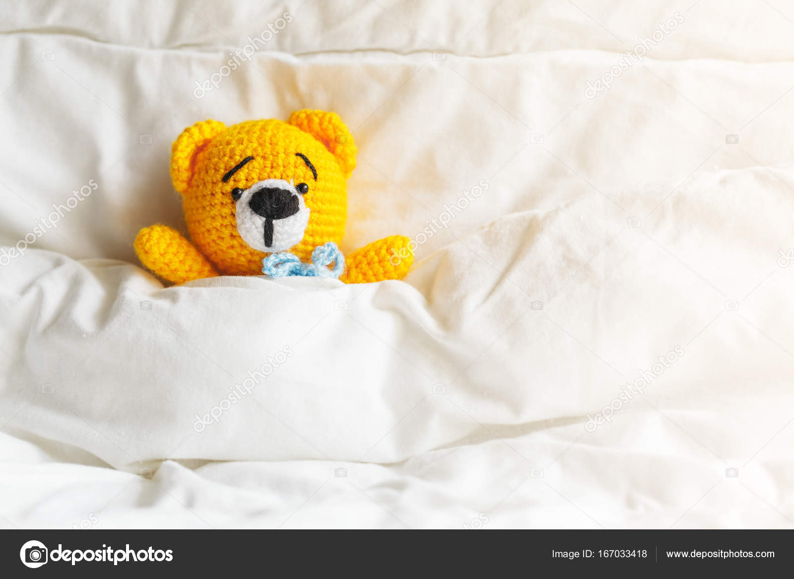 yellow and white teddy bear