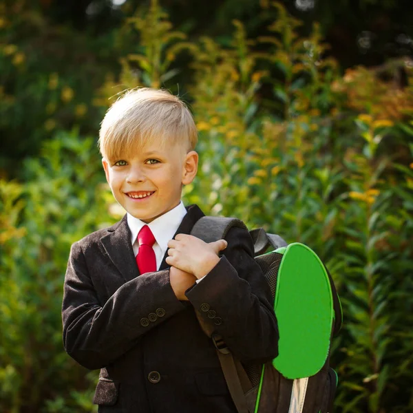 Cute boy going back to school. Boy in the suit. Closeup portrait — Stock Photo, Image