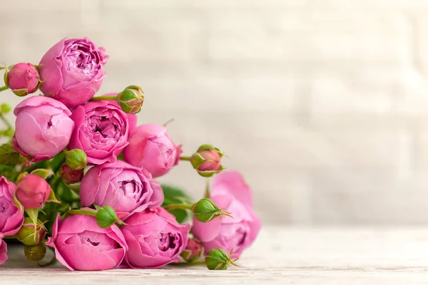 Beautiful Bouquet In Pink Wrapping Paper Roses And Other Delicate Beautiful  Flowers Stock Photo - Download Image Now - iStock
