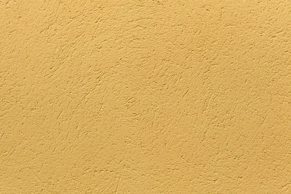 Parede de estuque pintada de ocre amarelo . — Fotografia de Stock