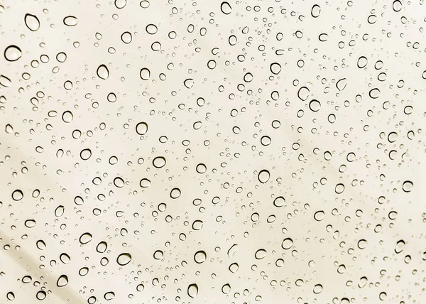 Gotas de agua sobre la ventana — Foto de Stock