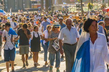 MONTEVIDEO, URUGUAY, MARCH - 2020 - Crowd at celebration act assumption of Lacalle Pou Herrera as new president of uruguayan republic  clipart