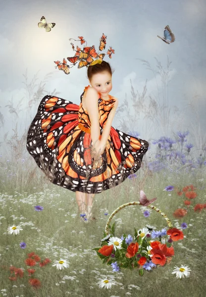 Niña en un vestido mariposas —  Fotos de Stock