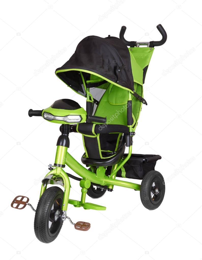Green tricycle isolated