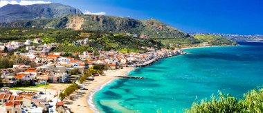 Greek holidays - beautiful Kalyves village with turquoise sea. Crete island. clipart
