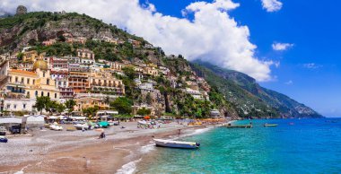Italian holidays - beautiful beach of Positano - scenic Amalfi coast. clipart
