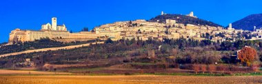 Panorama of medieval town Assisi - religious center of Umbria, Italy. clipart