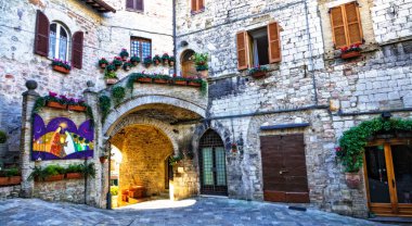 Medieval town Assisi - charming old streets. Italy clipart