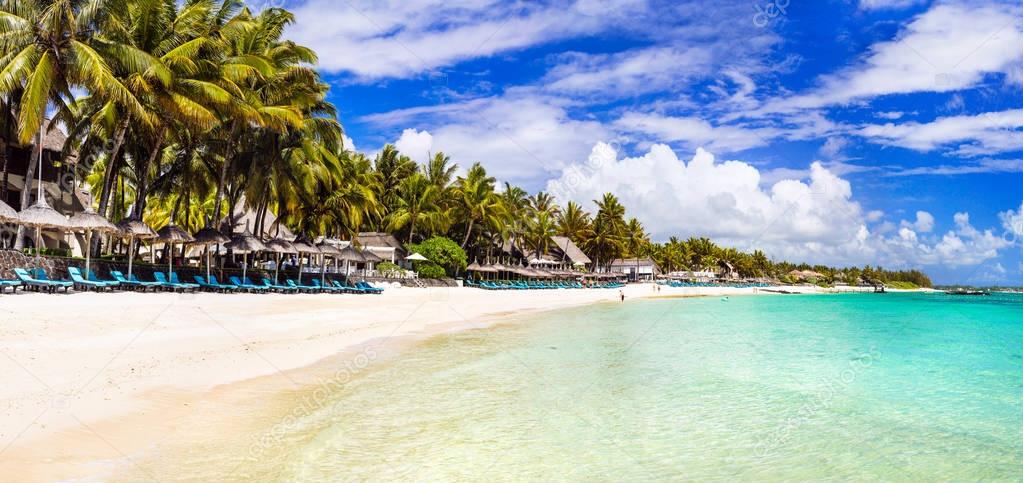 amazing long white sandy beaches of Mauritius island. Tropical holidays.