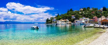 Greek holidays - tranquil village Loggos in gorgeous Paxos island. clipart