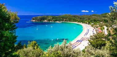 Greek holidays - turquoise beautiful beach Valtos in Parga clipart
