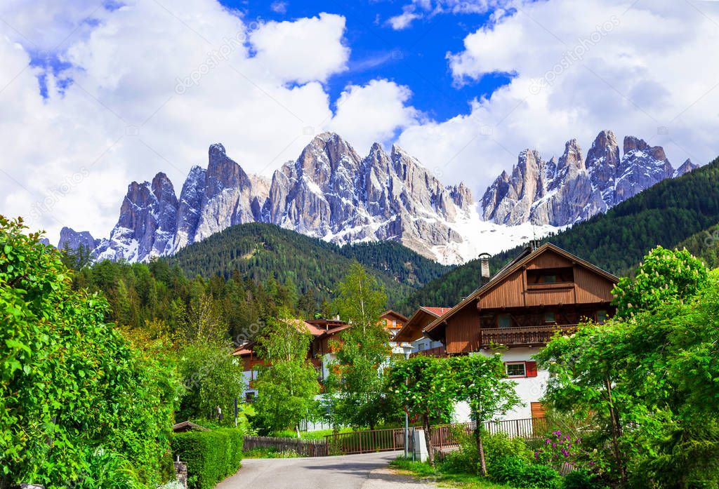 Alpine scenery - Dolomites mountains and traditional villages. Val di Funes,Italy.