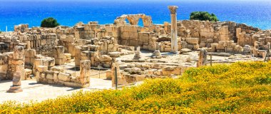 Ancient temples and turquoise sea - touristic attractions of Cyprus island,Kourion. clipart