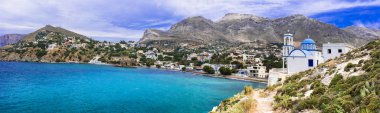 Beauty of  Kalymnos island - picturesque church overloong the sea,Greece  clipart