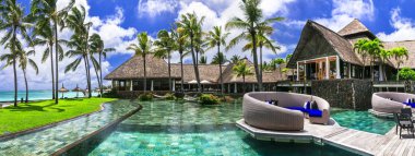 Exotic tropical vacation.beach bar with swim pool. Relaxing holidays.