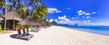 Most beautiful beaches of Mauritius island - Flic en Flac. Tropical paradise. clipart