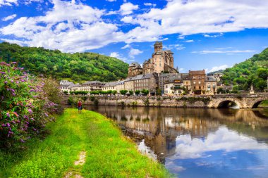 Travel and tourism in France. Estaing - one of the most beautiful villages. Aveyron department, Lot river. clipart