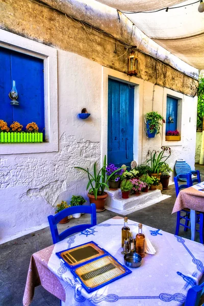 Typical street restaurants (taverns) of Greece. Paxos. Ionian island of Greece