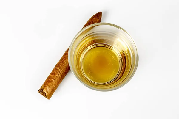 Expensive drink of whisky or rum with cigar on white — Stock Photo, Image