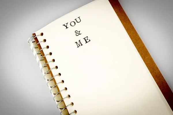 You and me text in emty book or diary — Stock Photo, Image