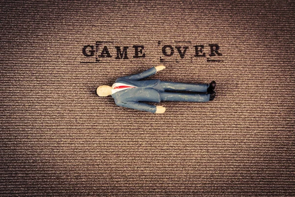 Text game over with human body — Stock Photo, Image