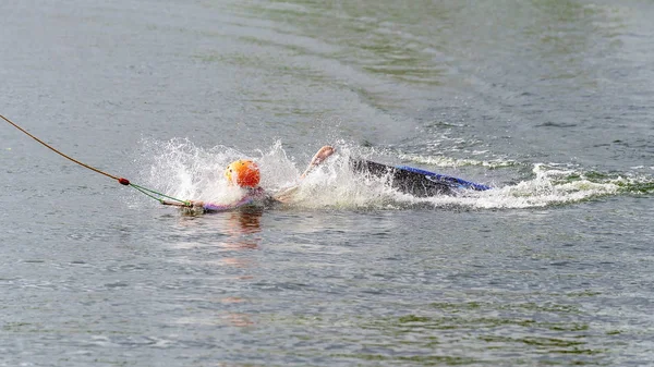 Child Falls Off Kneeboard At Cable Park — 스톡 사진
