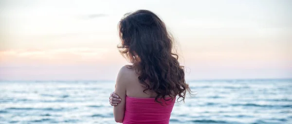 Woman standing on the sea — Stock Photo, Image