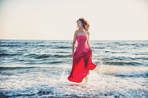 Woman standing on the sea — Stock Photo, Image