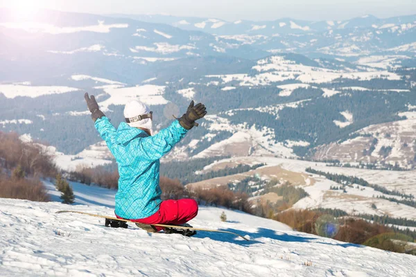 Young woman with snowboard — Stock Photo, Image