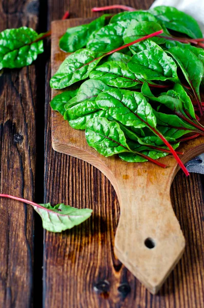 Fresh chard on a wooden board — Stock Photo, Image