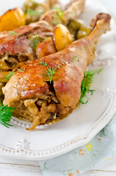 Baked turkey legs with Brussels sprouts and lemon