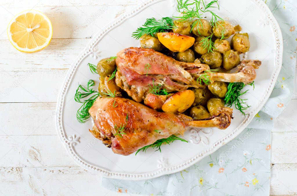 Baked turkey legs with Brussels sprouts and lemon