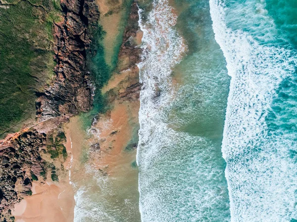 Aerial view of a rocky beach Stock Image