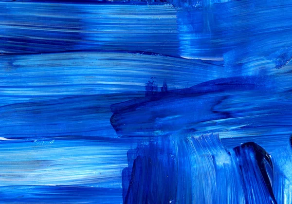 Blue acrylic dynamic brush stroke. Hand painted texture, background