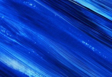 Yaratıcı mavi el boyası arkaplan, duvar kağıdı, doku, fırça darbeleriyle tuval üzerinde akrilik resmin yakın plan parçası.