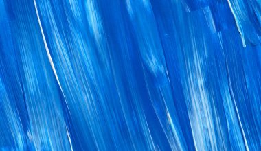 Yaratıcı mavi el boyası arkaplan, duvar kağıdı, doku, fırça darbeleriyle tuval üzerinde akrilik resmin yakın plan parçası.