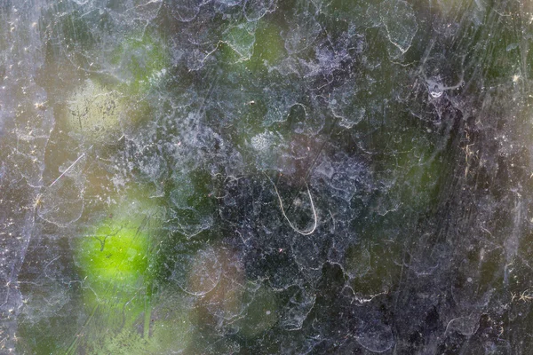 ボケの背景を持つガラスのほこりや汚れ — ストック写真