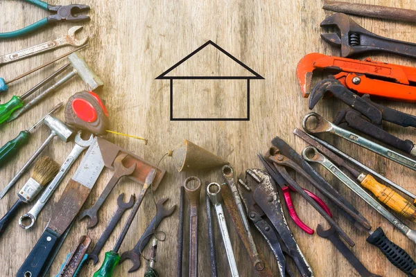 Old set of work tool on wooden background — Stock Photo, Image