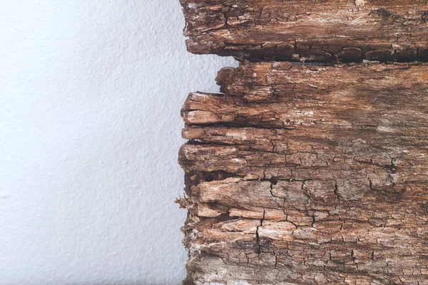 Closeup texture and background of old wood panel on white cement — Stock Photo, Image