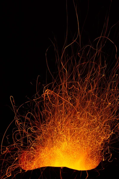 Sparking of burning charcoal. — Stockfoto