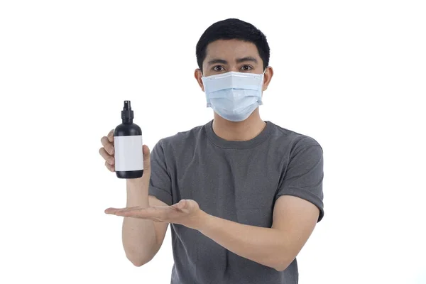 Asian young man in flu mask against with a corona virus pandemic, or prevent flu disease or cold during winter