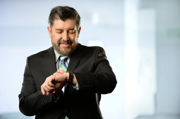 Hispanic Businessman Using Smart Watch — Stock Photo, Image