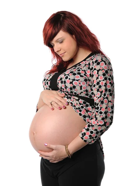 Kobieta w ciąży trzymająca żołądek — Zdjęcie stockowe