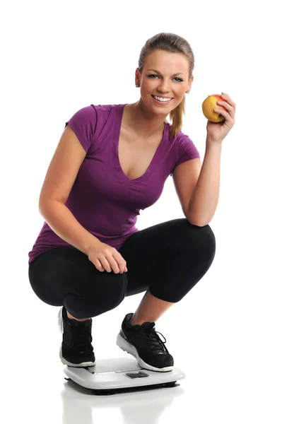 Young Woman Stepping on Scale — Stock Photo, Image